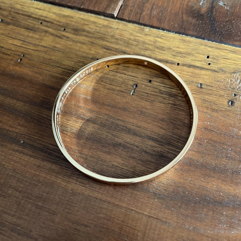 Kate Spade “Stop and Smell The Roses” gold bracelet